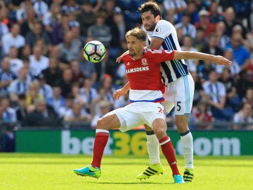 Middlesbrough's Gaston Ramírez vies with West Bromwich Albion's Claudio Yacob during the match