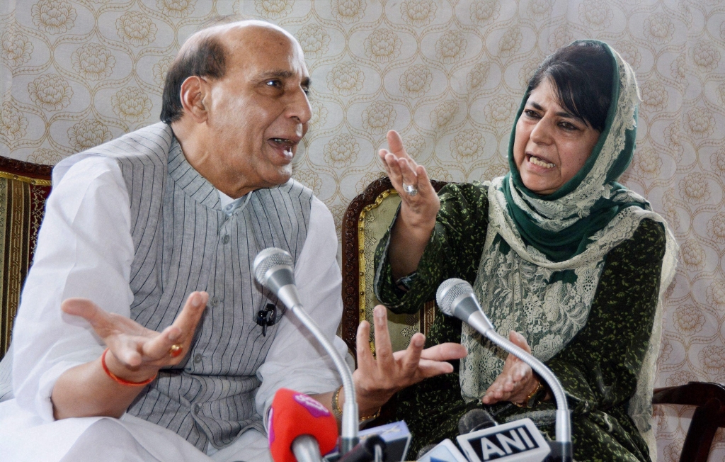 Union home minister Rajnath Singh and Jammu and Kashmir chief minister Mehbooba Mufti interact with journalists during a press conference in Srinagar on Thursday. Credit PTI