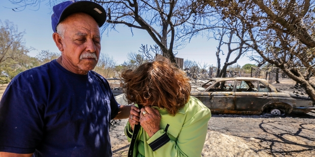 Miguel and Mabel Ramos both 73 are distraught at the devastation caused by the Blue Cut Fire