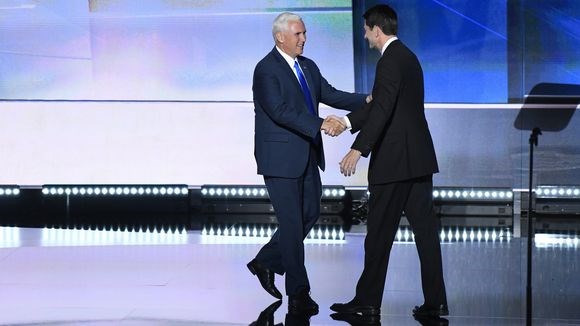 Mike Pence shakes hands with Paul Ryan during the Republican National Convention in Cleveland