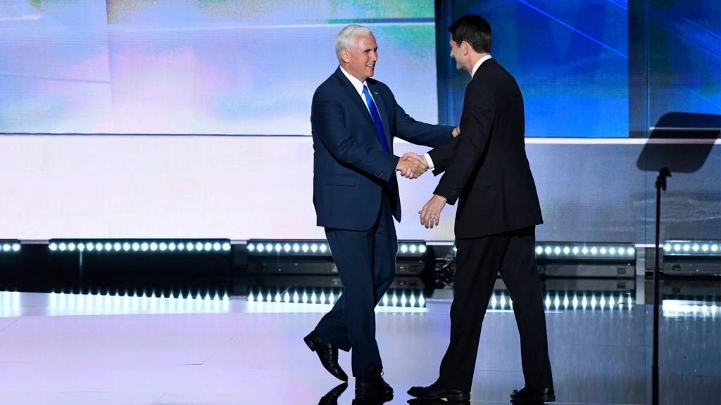 Mike Pence shakes hands with Paul Ryan during the Republican National Convention in Cleveland