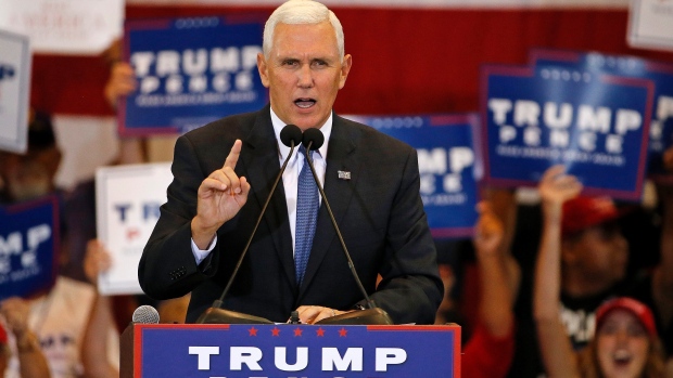 Republican vice-presidential nominee Mike Pence speaks at a campaign rally on Tuesday in Phoenix. Pence is breaking with Donald Trump the presidential nominee by endorsing House Speaker Paul Ryan in his primary fight