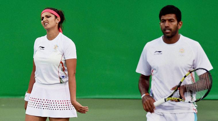 Rio de Janerio India's Sania Mirza and Rohan Bopanna leave the court after losing the mixed-doubles semifinal match against Venus Williams and Rajeev Ram of USA at the 2016 Summer Olympics in Rio de Janerio Brazil on Satuday. PTI