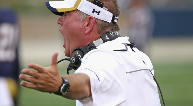 SOUTH BEND IN- SEPTEMBER 26 Head coach Brian Kelly of the Notre Dame Fighting Irish yells at a referee during a game against the Massachusetts Minutemen at Notre Dame Stadium