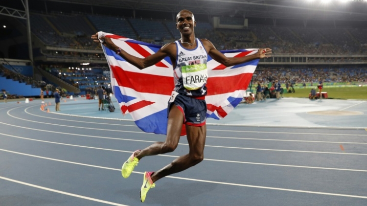 Britain's Mo Farah celebrates winning the Men's 5000m Final