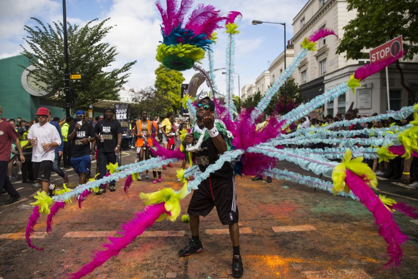 A performer takes part in the Notting Hill Carnival on August 28. The Metropolitan Police reported at least four men stabbed on the first day of the festival in west London