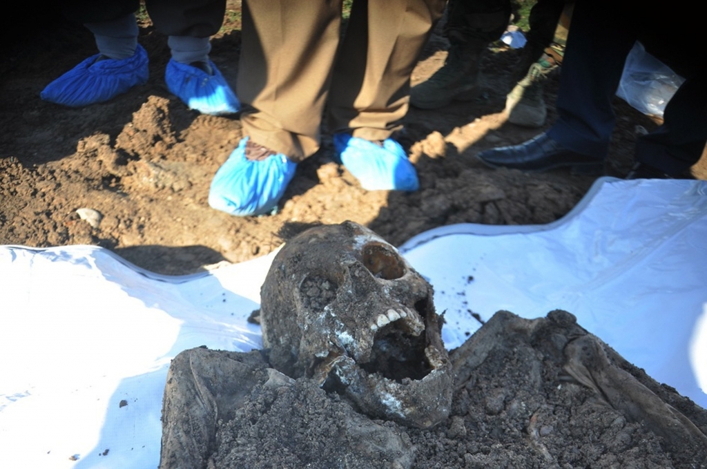 Mass graves left behind by Isis militants discovered in Iraq and Syria