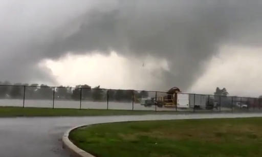 This image made from a video shows a tornado Wednesday Aug. 24 2016 in Kokomo Ind. ﻿Multiple tornadoes touched down in central Indiana on Wednesday tearing the roofs off apartment buildings sending air conditioners falling onto parked cars and cut