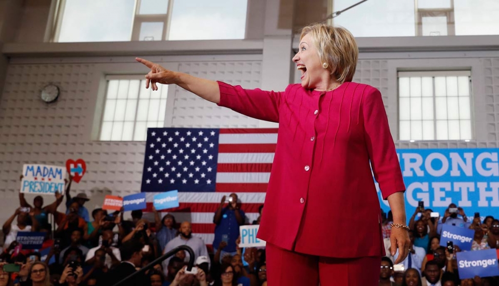 Democratic presidential candidate Hillary Clinton reacts to the cheering crowd as she arrives at a Pennsylvania Democratic Party voter registration event at West Philadelphia High School in Philadelphia Tuesday Aug. 16 2016