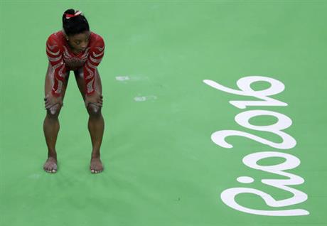 Simone Biles waits her turn to train on the beam ahead of the 2016 Summer Olympics in Rio de Janeiro Brazil. It shouldn't come as a surprise that some of the best-recognized names on the U.S. Olympic team belong to women. Biles is one of a record 29