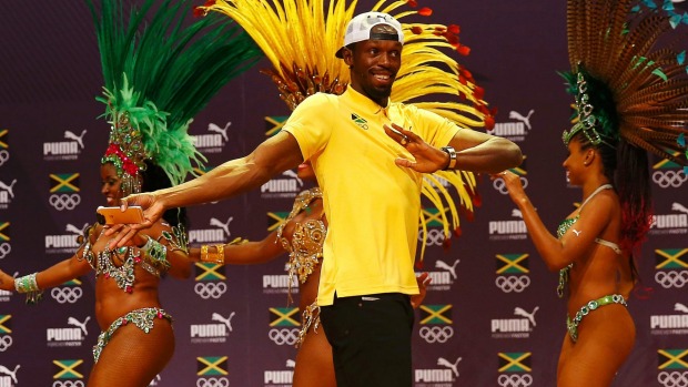 Usain Bolt shows off his samba moves at a press conference