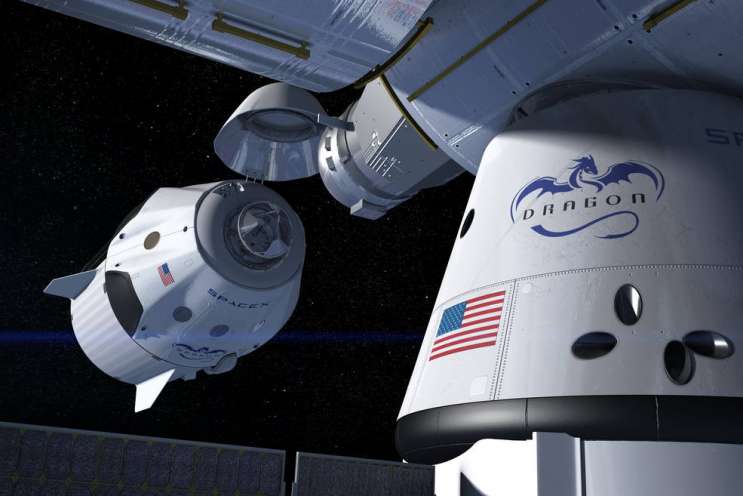 This artist's concept shows a SpaceX Crew Dragon docking with the International Space Station as it will during a mission for NASA's Commercial Crew Program. NASA is partnering with Boeing and SpaceX to build a new generation of human-rated spa