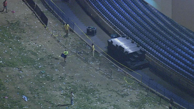 NBC10Caution tape was placed across a gap in railing where the barrier collapsed during a Snoop Dogg and Wiz Khalifa concert Friday night