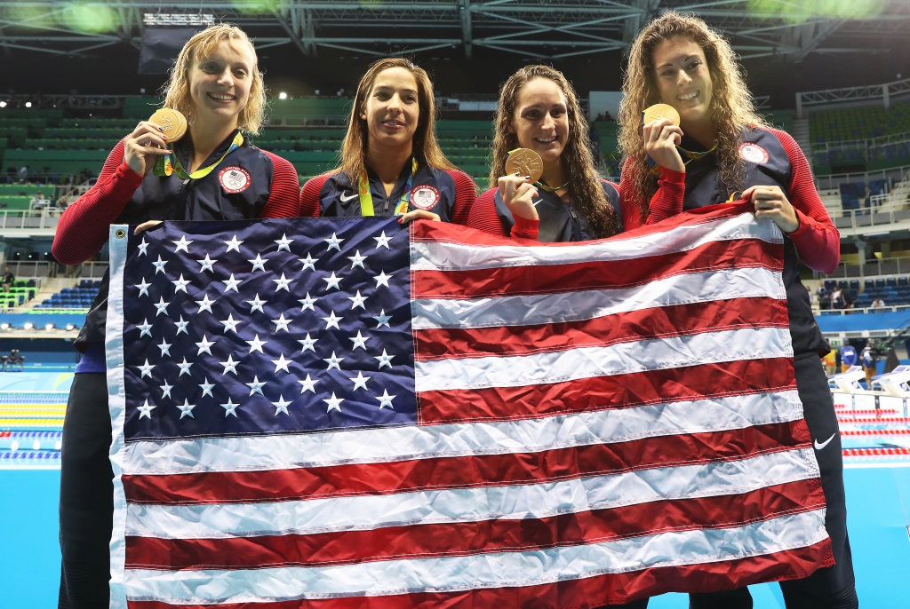 Katie Ledecky Maya Dirado Leah Smith and Allison Schimdt of United States pose with their Gold medals from the Women's 4 x 20m Freestyle Relay on Day 5 of the Rio 2016 Olympic Games at the Olympic Aquatics Stadium in Rio de Janeiro