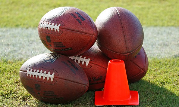 DAVIE FL- AUGUST 10 Footballs on the turf of the Miami Dolphins field during the teams training camp