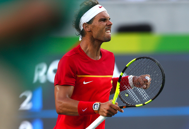 Spain's Rafael Nadal reacts after winning a point against Juan Martin del Potro of Argentina in the semifinals of the men's singles tennis competition at the