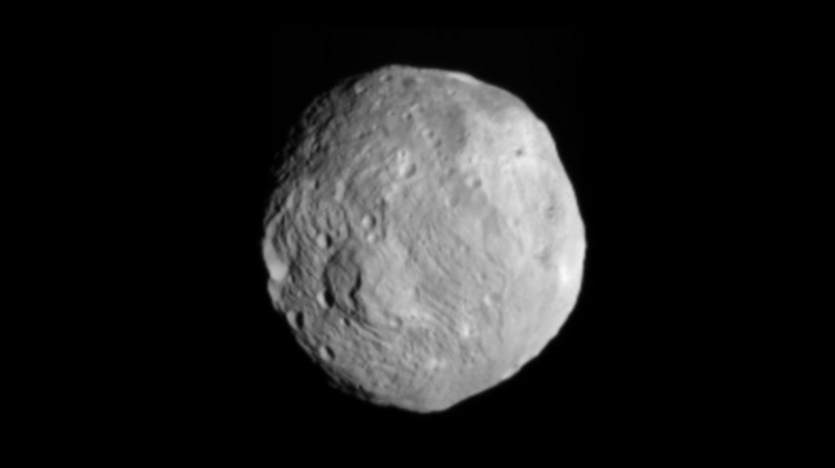 An image obtained by NASA's Dawn spacecraft of the giant asteroid Vesta with its framing camera