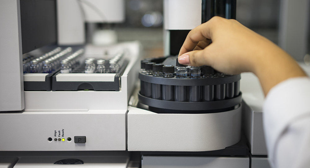 A lab technician checks samples to be tested for doping