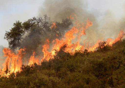 The Latest: Evacuations ordered in new Washington fire