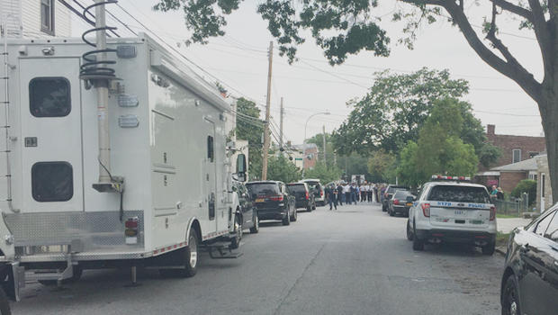 New York City police at the scene of an officer-involved shooting that left a burglary suspect injured on Monday