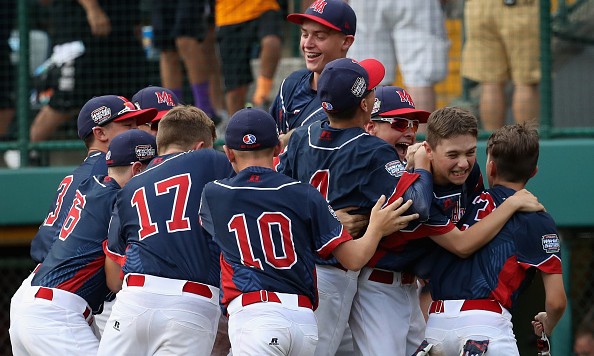 SOUTH WILLIAMSPORT PA- AUGUST 27 Members of the Mid Atlantic Team from New York celebrate after defeating the Asia Pacific team from South Korea 2-1 to win the Little League World Series Championship Game at Lamade Stadium