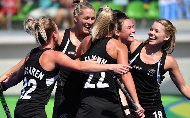 New Zealand's Kelsey Smith clebrates her goal with teammates during the the women's quarterfinal field hockey New Zealand vs Australia match of the Rio 2016 Olympics Games at the Olympic Hockey Centre in Rio de Janeiro