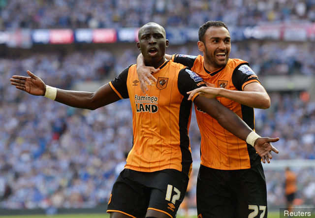 Mohamed Diame celebrates scoring the first goal for Hull City with Ahmed Elmohamady