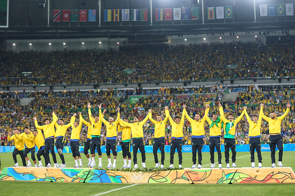 RIO DE JANEIRO BRAZIL- AUGUST 20 Players of Brazil celebrate on the podium after the Men's Football Final between Brazil and Germany at the Maracana Stadium on Day 15 of the Rio 2016 Olympic Games