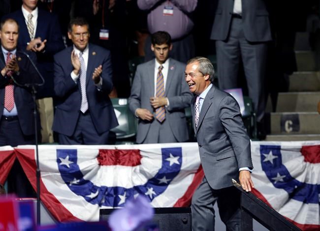 Nigel Farage ex-leader of the British UKIP party arrives onstage to speak at Republican presidential candidate Donald Trump's campaign rally in Jackson Miss. Wednesday Aug. 24 2016