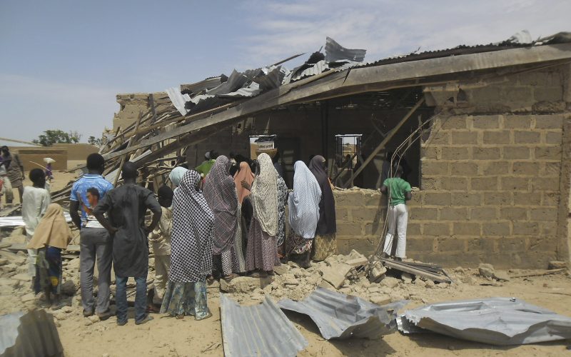 Nigerians at an Evangelical church in Potiskum after a suicide attack by Boko Haram