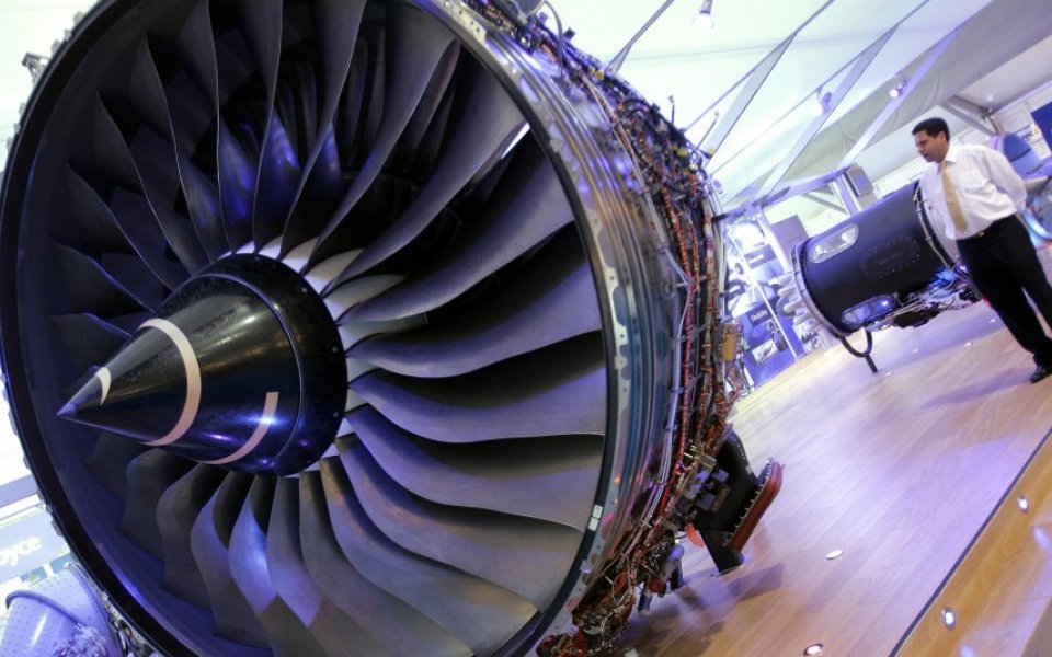 A visitor looking at a Rolls Royce Trent