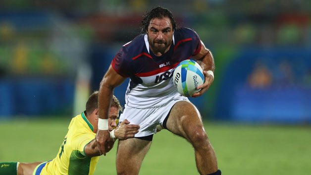 Nate Ebner of the United States beats Felipe Claro of Brazil to score a try during the Men's Rugby Sevens Pool A match on Day 4 of the Rio 2016 Olympic Games