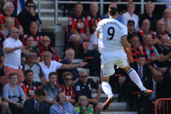 Manchester United's Swedish striker Zlatan Ibrahimovic celebrates scoring their third goal during the English Premier League football match between Bournemouth and Manchester United at the Vitality Stadium in Bournemouth southern England