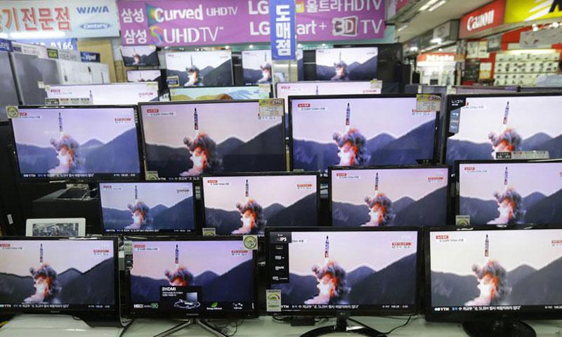 TV screens show file footage of a similar North Korea's ballistic missile that North Korea claimed to have launched from underwater at the Yongsan Electronic store in Seoul South Korea Wednesday Aug. 24 2016. A North Korean ballistic missile fire