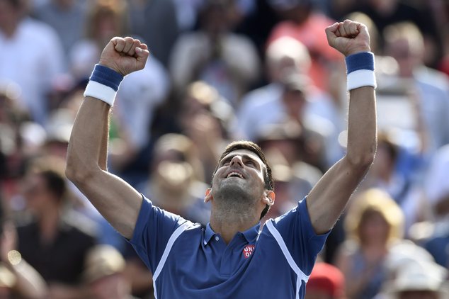 Novak Djokovic of Serbia celebrates his win over Kei Nishikori of Japan during the men's final of the Rogers Cup tennis tournament Sunday