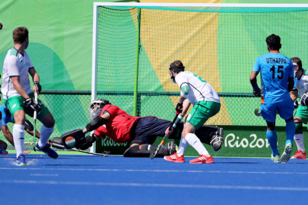 Ireland's goalkeeper David Harte concedes a goal against India