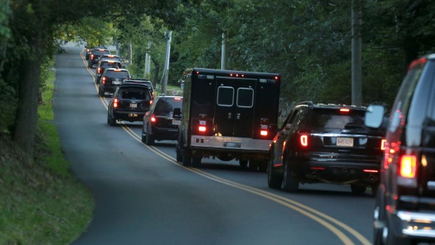 The motorcade with US President Barack Obama returns to his compound after he attended a fundraiser in support