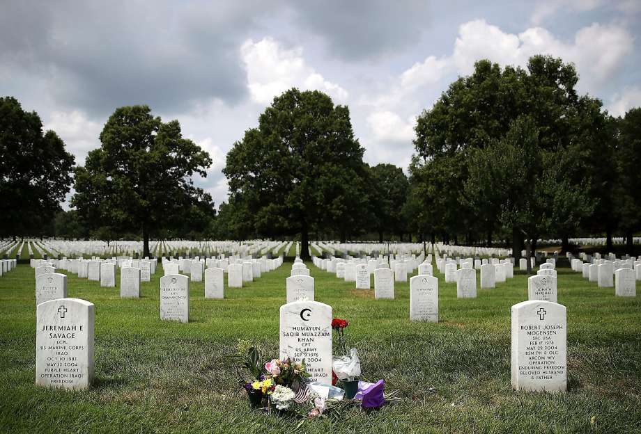 The grave of Army Capt. Humayun Khan is shown at Arlington National Cemetery in Virginia. Khan was killed in Iraq in 2004. His parents appeared at the Democratic convention last week