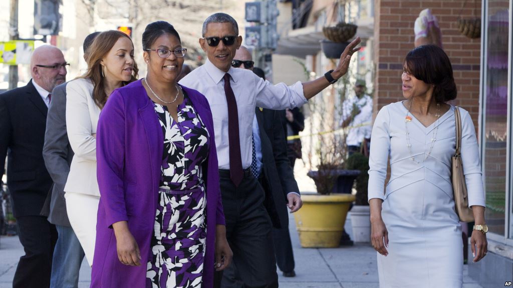 FILE- After commuting the sentences of several dozen drug offenders President Barack Obama meets with former inmates to learn about re-entry challenges at a restaurant in Washington D.C