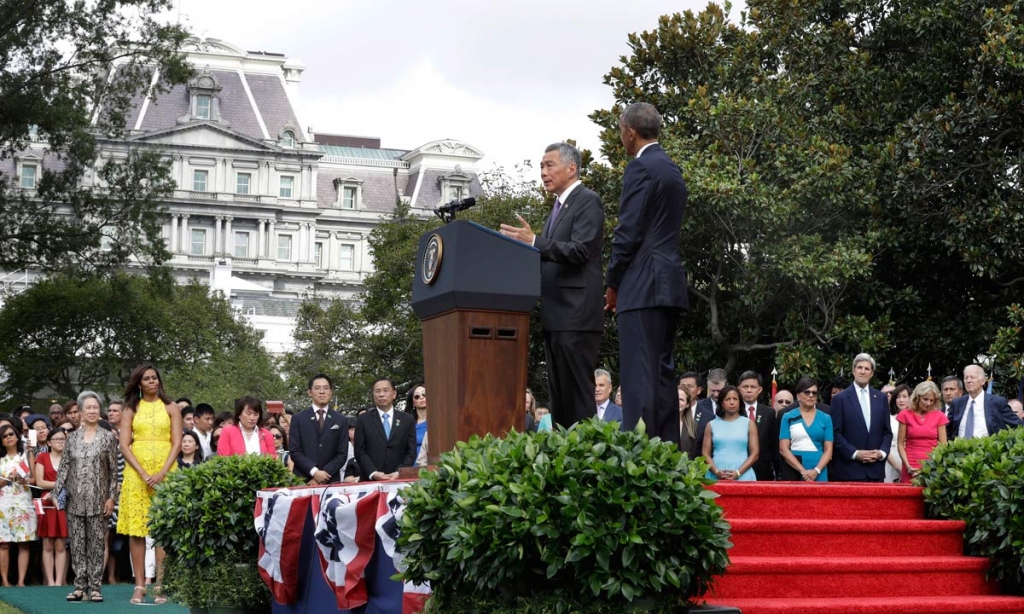 President Barack Obama listens as Singapore's Prime Minister Lee Hsien Loong speak during a state arrival ceremony on the South Lawn of the White House in Washington Tuesday Aug. 2 2016