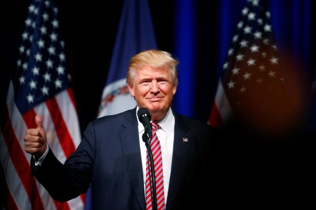 Republican US presidential nominee Donald Trump attends a campaign event at Briar Woods High School in Ashburn Virginia