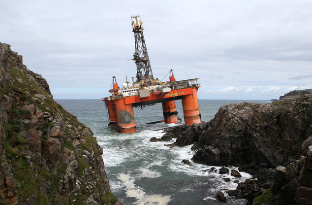 2016 showing the Transocean Winner drilling rig as it broke free from tug boats in rough seas and ran aground off