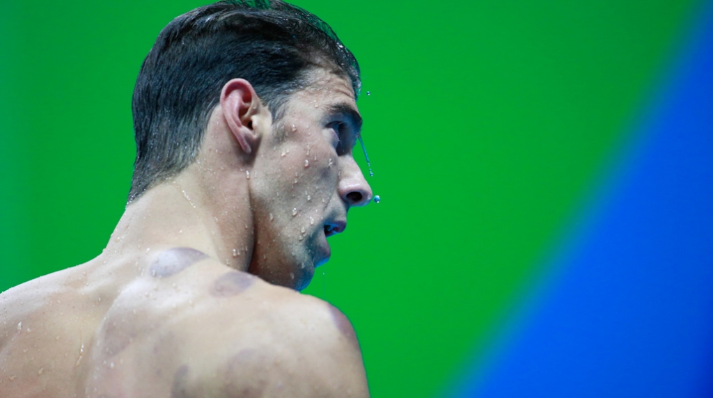 RIO DE JANEIRO BRAZIL- AUGUST 08 Michael Phelps of the United States looks on after the Men's 200m Butterfly heat on Day 3 of the Rio 2016 Olympic Games at the Olympic Aquatics Stadium