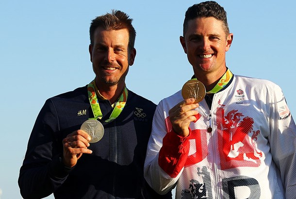 Justin Rose of Great Britain celebrates with the gold medal and Henrik Stenson of Sweden silver medal after the final round of men's golf on Day 9 of the Rio 2016 Olympic Games