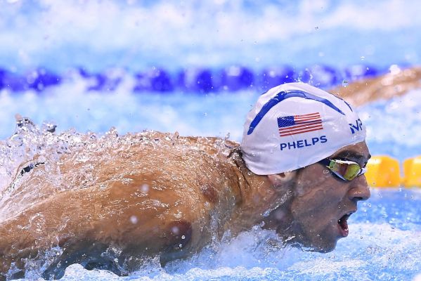 USA's Michael Phelps competes in a Men's 100m