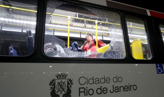 Windows Smashed As Olympic Media Bus Attacked