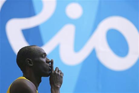 Jamaica's Usain Bolt arrives in the stadium to compete in a men's 100-meter heat during the athletics competitions of the 2016 Summer Olympics at the Olympic stadium in Rio de Janeiro Brazil Saturday Aug. 13 2016