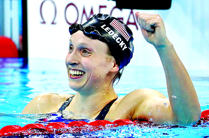 United States’ Katie Ledecky celebrates after winning gold in the women’s 800-meter freestyle final during the swimming competitions at the 2016 Summer Olympics in Rio de Janeiro Brazil