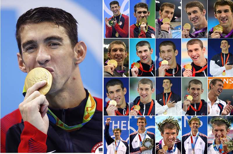 Michael Phelps of United States poses with his gold medal from the Men's 4x100 Meter Freestyle Relay during Day 2 of the Rio 2016 Olympic Games at Olympic Aquatics Stadium