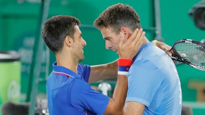 Juan Martin del Potro of Argentina cries while hugging Novak Djokovic of Serbia after defeating him in the men's tennis competition at the 2016 Summer Olympics in Rio de Janeiro Brazil Sunday Aug. 7 2016